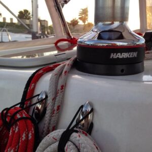 Halyard Hangers holding lines near a cockpit winch